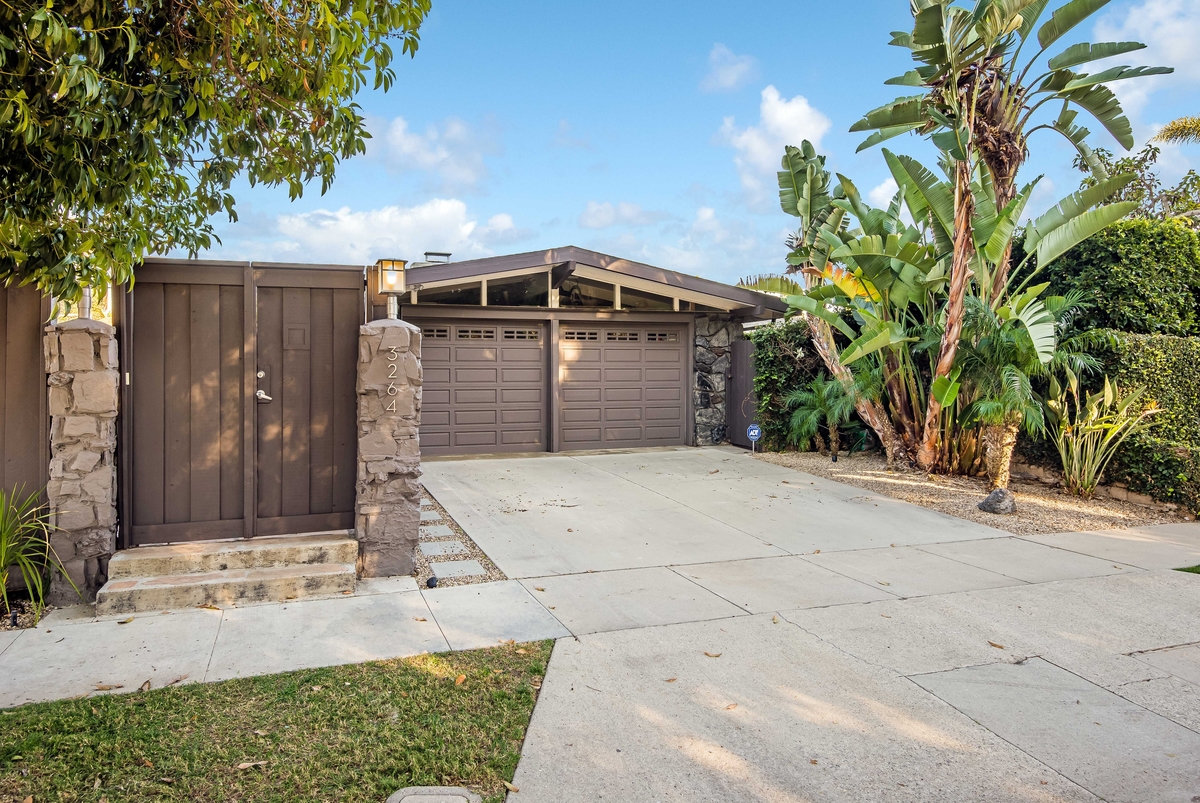 Two car garage and gated entry to home